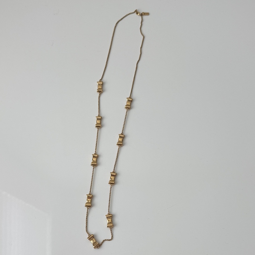 Kate Spade Gold Necklace with Bow Accents